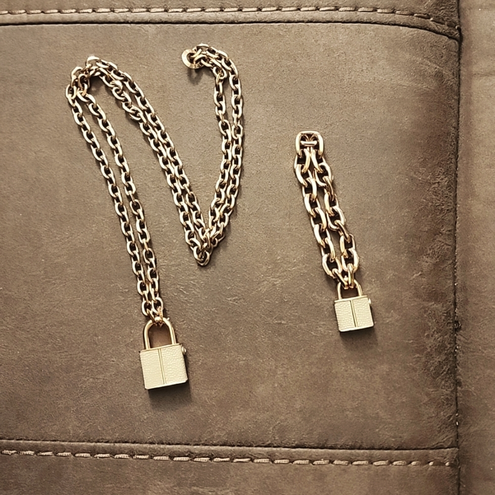 HENRI BENDEL matching set necklace and bracelet with swarovski crystals on locks